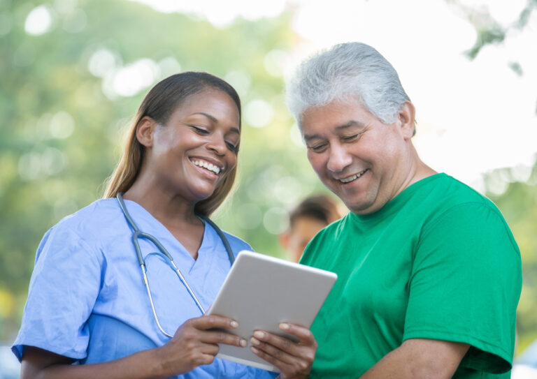 Nurse working in public health with elderly man